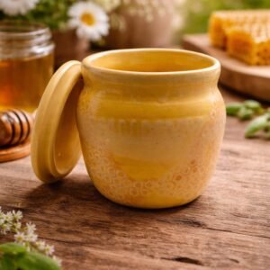 Handmade honey glaze pot with lid ceamic storage jar with wam golden finish.